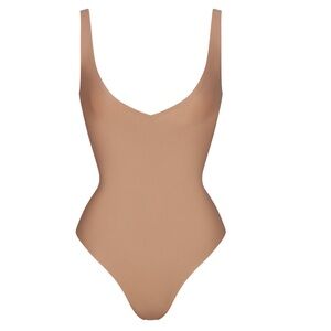 SKIMS BODY UNLINED PLUNGE THONG BODYSUIT (Sienna XXS)